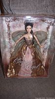 Front view of the 2011 Couture Angel Barbie Doll in original packaging, showing detailed gown and wings.