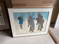 Framed print leaning against wall showing overall item and frame condition.