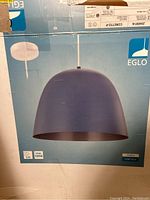 Box showing product image and label with brand Eglo and model Coretto-P 204181A.