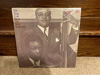 Front cover of the Nat King Cole LP titled "From The Very Beginning" showing the main album artwork.