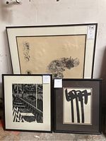 Overview of three framed abstract prints standing side by side