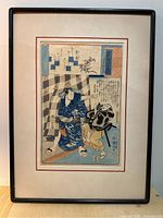 Full view of framed woodblock print showing mat and frame