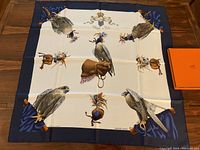 Full view of scarf laid flat with box visible at top right