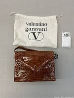 Handbag with original Valentino dust bag and auction tag