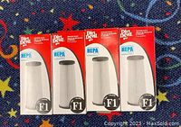 Four Dirt Devil F1 HEPA vacuum canister filters in original packaging, showing front of boxes with Dirt Devil logo, model F1, and HEPA labeling.