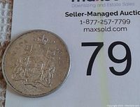 Reverse side showing Canadian coat of arms, denomination, and year 1964.