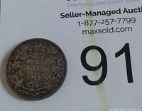 Reverse side of 1914 Canadian 25 cents silver coin showing denomination and date surrounded by maple leaves