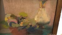 Close-up view of the pastel drawing showing the basket with various fruits and a jug next to it in soft blended colors.
