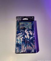Front view of new, unopened Pokémon Burning Shadows Alolan Ninetales Prerelease Deck sealed in original plastic.