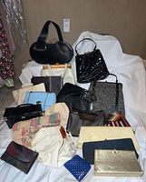 Full view of all vintage purses displayed together showing variety of shapes, sizes, and colors.