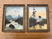 Pair of framed miniature oil paintings on textured paper, both signed, showing mountain river and lakeside scenes