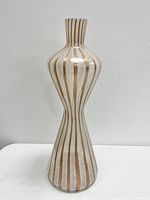 Full front view of waisted Murano glass vase, white and amber gold stripes