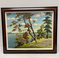 Frontal view of the framed oil painting showing entire landscape scene