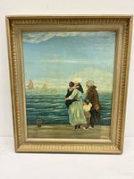 Full front view of framed oil painting depicting family by the sea with sailboats