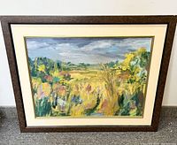 Framed impressionist landscape oil painting on canvas showing colorful fields and trees with sky, signed by Kesterbrook, with visible cream matte and brown wood frame.