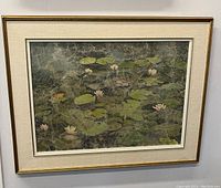 Front view of framed painting on wall.