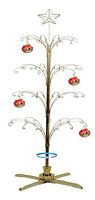 Full image of the gold tone metal Christmas ornament tree with a star topper, displaying hanging red and gold ornaments on curved branches.