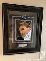 Framed signed photo of Wendel Clark with plaque under glass