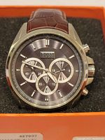 Front view of Hugo Boss chronograph watch showing dial, sub-dials, and stainless steel case.