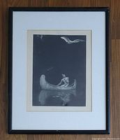 Framed photogravure artwork showing the full image and frame with a person in a canoe and a bird.
