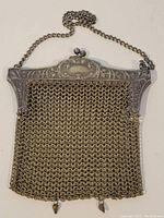Full view of the vintage German silver mesh purse with chain strap and metal frame.