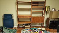 Full view of two-section mid-century modern shelving and cabinet system