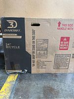 Box front showing Dynacraft logo, 24" bicycle label, model information