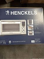 Photo of Henckels convection countertop oven box showing product image and specifications