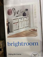 Box cover showing assembled sliding bin frame with six white bins, brand name Brightroom