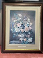 Frontal view of the framed floral print showing bouquet in vase and signature.