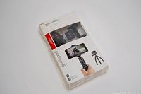 Box front showing Joby Gorillapod GripTight tripod and Bluetooth remote kit for smartphones and action cameras.