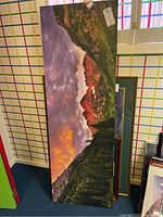 Large rectangular printed canvas depicting mountains with sunset sky.