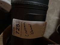 Close-up photo of sticker labeling the lot as 'Craftsman blower'.