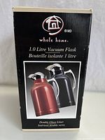Box packaging with image and description of the vacuum flask showing 1.0 litre capacity and double glass liner.