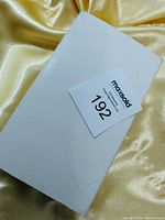 White box with lot number 192 for the Santa figurine