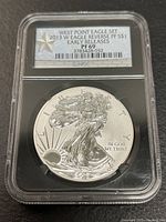 Front view of the coin encapsulated in NGC protective slab showing Lady Liberty design