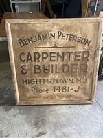 Full view of antique Benjamin Peterson carpenter and builder sign with frame. Shows overall dirt and discoloration.