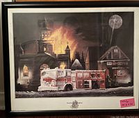 Framed print titled 'Northern Firefighter' depicting a red fire truck in front of a burning building at night with snow and full moon.