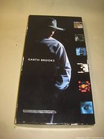 Black Garth Brooks boxed set cover with his silhouette looking back, showing thumbnails of included CDs.