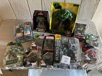 Overview of all six Hulk-related figures in original packaging