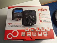 Front of Fujitsu FD7 dashcam box showing product and key features