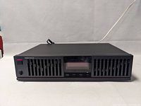 Front view of Nikko EQ100 stereo graphic equalizer showing overall design and condition.