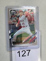 Front view of 2021 Topps Chrome #159 Shohei Ohtani baseball card showing pitching pose, card in protective plastic sleeve.