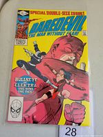 Front cover of Daredevil #181 Marvel comic book. Features Daredevil, Bullseye and Elektra characters in action with bright yellow background and headline text.