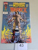 Front cover of Marvel Comics Presents #72 showing Weapon X character in metal restraints with flames and mechanical background.