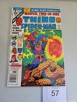 Front cover of Marvel Two-in-One Annual #2 comic showing vibrant cover art featuring The Thing, Spider-Man, and Thanos. Shows price and issue details.