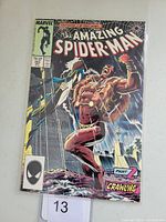 Front cover of The Amazing Spider-Man #293 comic book featuring Kraven the Hunter with part 2 of 'Crawling' story.