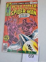 Front cover of The Spectacular Spider-Man #27 comic showing Spider-Man and Daredevil