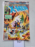 Front cover of Uncanny X-Men #113 showing characters in battle with fiery background, 35 cent price, dated September