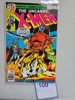 Front cover photo of Uncanny X-Men #116 comic book showing artwork of characters and bright colorful cover.